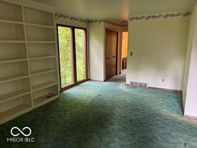 310 S Shady Ln, Muncie, IN 47304 - empty room featuring carpet and healthy amount of natural light