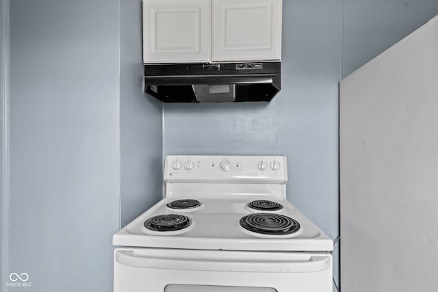703 Kappes St, Indianapolis, IN 46221 - kitchen featuring white electric range oven, under cabinet range hood, and white cabinets