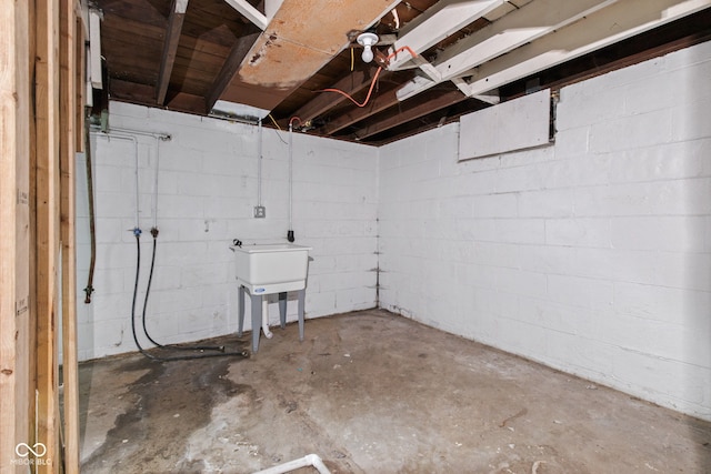 703 Kappes St, Indianapolis, IN 46221 - unfinished basement with concrete block wall