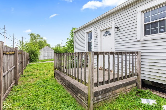 703 Kappes St, Indianapolis, IN 46221 - view of exterior entry featuring a wooden deck