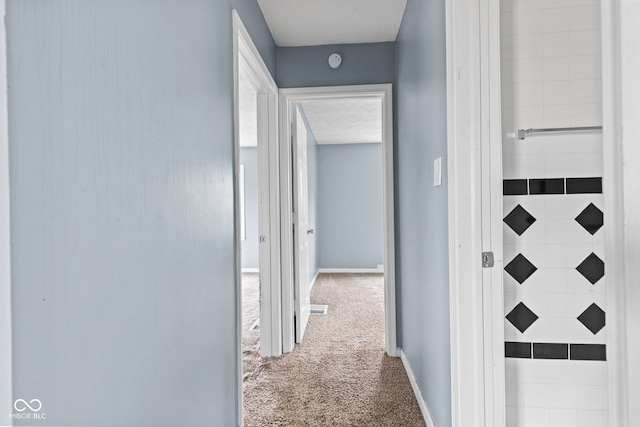 703 Kappes St, Indianapolis, IN 46221 - corridor featuring carpet and baseboards