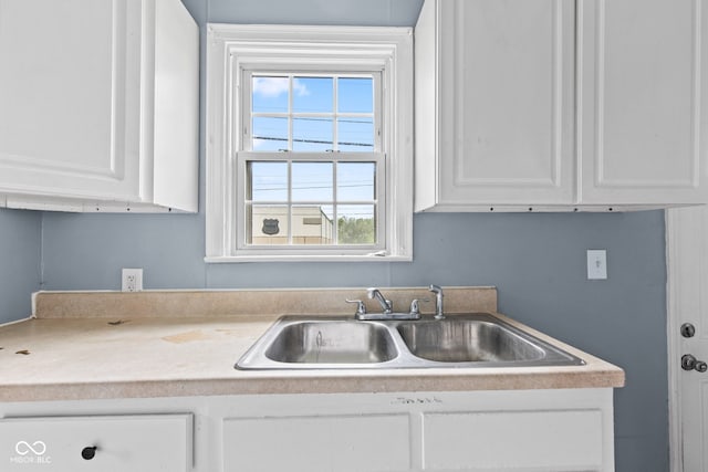 703 Kappes St, Indianapolis, IN 46221 - kitchen with a sink, healthy amount of natural light, and white cabinetry
