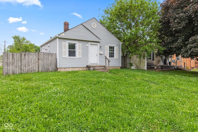703 Kappes St, Indianapolis, IN 46221 - view of front of house featuring a chimney