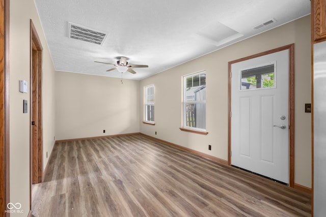 632 W Central Ave, Greensburg, IN 47240 - foyer featuring light wood-type flooring, baseboards, and ceiling fan