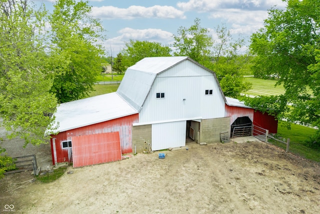 view of barn with an exterior structure