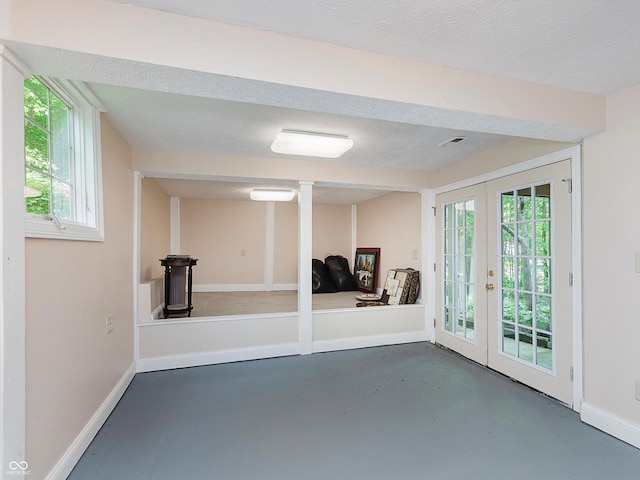10350 Courageous Dr, Indianapolis, IN 46236 - below grade area with french doors and baseboards