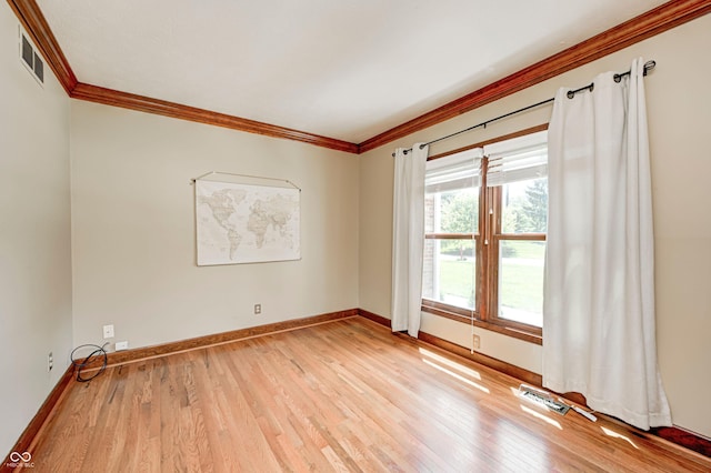 9158 Oak Knoll Ln, Fishers, IN 46037 - unfurnished room featuring ornamental molding and light wood-type flooring