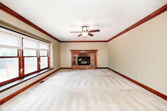 9158 Oak Knoll Ln, Fishers, IN 46037 - unfurnished living room with ceiling fan, light colored carpet, a fireplace, and ornamental molding