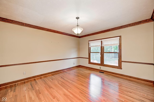 9158 Oak Knoll Ln, Fishers, IN 46037 - unfurnished room featuring light wood-style floors and ornamental molding