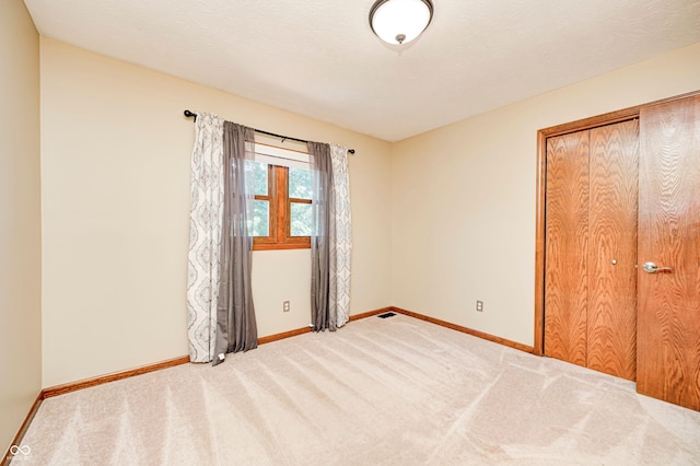 9158 Oak Knoll Ln, Fishers, IN 46037 - unfurnished bedroom featuring carpet floors and a closet