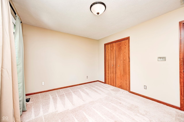 9158 Oak Knoll Ln, Fishers, IN 46037 - unfurnished bedroom with a closet and carpet floors