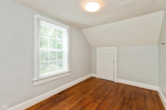 1661 S Talbott St, Indianapolis, IN 46225 - additional living space featuring wood-type flooring, baseboards, and lofted ceiling