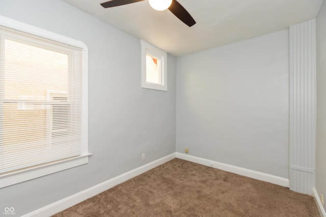 1661 S Talbott St, Indianapolis, IN 46225 - carpeted empty room featuring a ceiling fan and baseboards