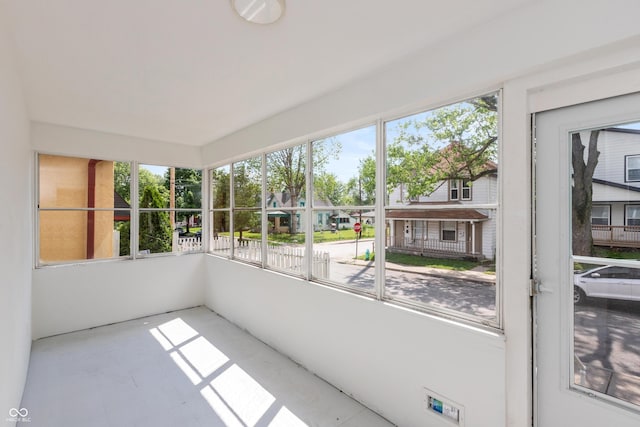 1661 S Talbott St, Indianapolis, IN 46225 - unfurnished sunroom featuring plenty of natural light and a residential view
