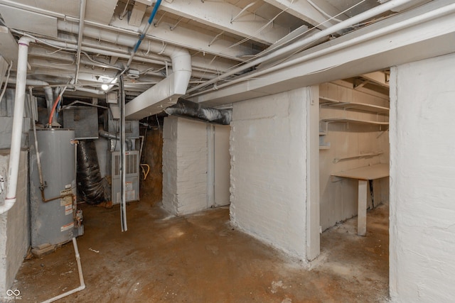1661 S Talbott St, Indianapolis, IN 46225 - unfinished basement featuring gas water heater