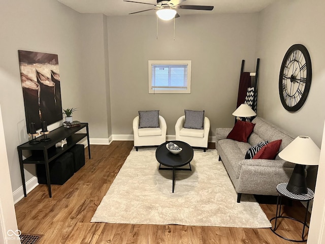 1661 S Talbott St, Indianapolis, IN 46225 - living room with ceiling fan and wood finished floors