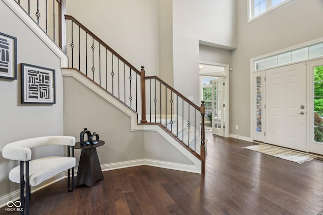 3744 Abney Point Dr, Carmel, IN 46077 - foyer with wood-type flooring, stairway, baseboards, and a towering ceiling