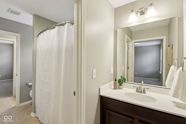 3744 Abney Point Dr, Carmel, IN 46077 - full bath featuring toilet, vanity, baseboards, tile patterned flooring, and a shower with curtain