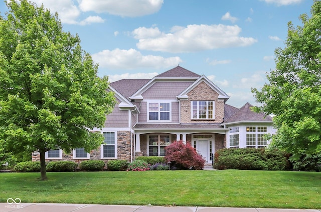 3744 Abney Point Dr, Carmel, IN 46077 - view of front of house featuring stone siding and a front yard