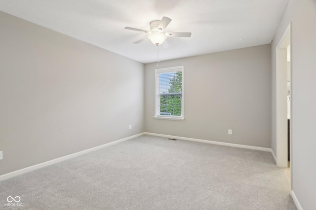 3744 Abney Point Dr, Carmel, IN 46077 - spare room with a ceiling fan, light carpet, and baseboards