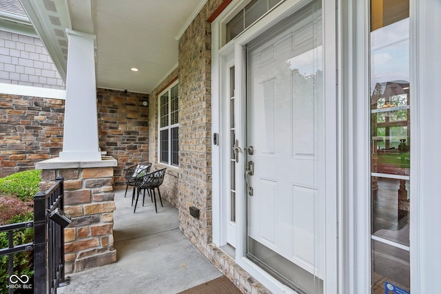 3744 Abney Point Dr, Carmel, IN 46077 - view of exterior entry with covered porch and stone siding