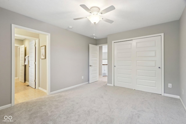 3744 Abney Point Dr, Carmel, IN 46077 - unfurnished bedroom featuring light colored carpet, a closet, baseboards, and connected bathroom