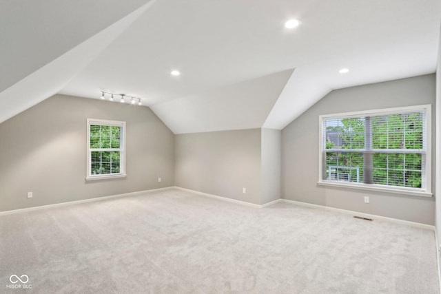 3744 Abney Point Dr, Carmel, IN 46077 - additional living space with carpet, vaulted ceiling, recessed lighting, and baseboards