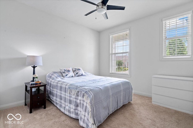 16573 Cava Dr, Fishers, IN 46037 - bedroom featuring light carpet, baseboards, and ceiling fan