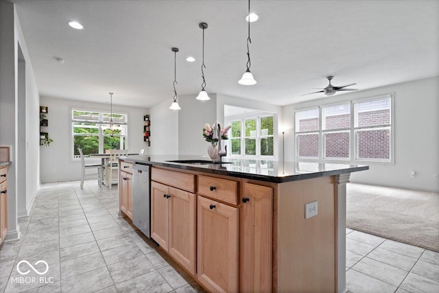 16573 Cava Dr, Fishers, IN 46037 - kitchen featuring dishwasher, a sink, ceiling fan, a center island, and baseboards