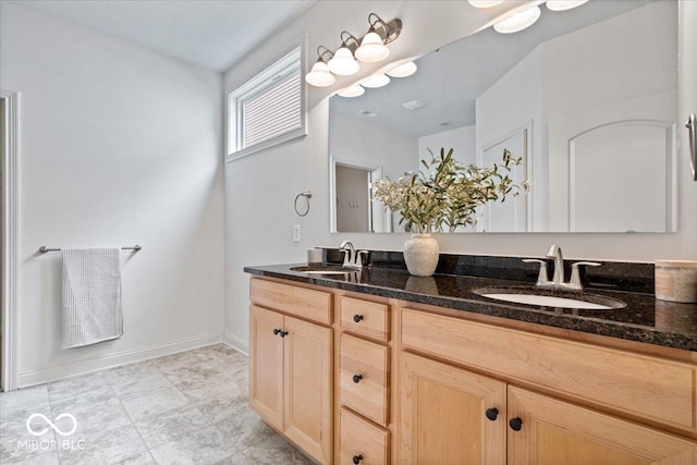 16573 Cava Dr, Fishers, IN 46037 - full bath featuring double vanity and baseboards