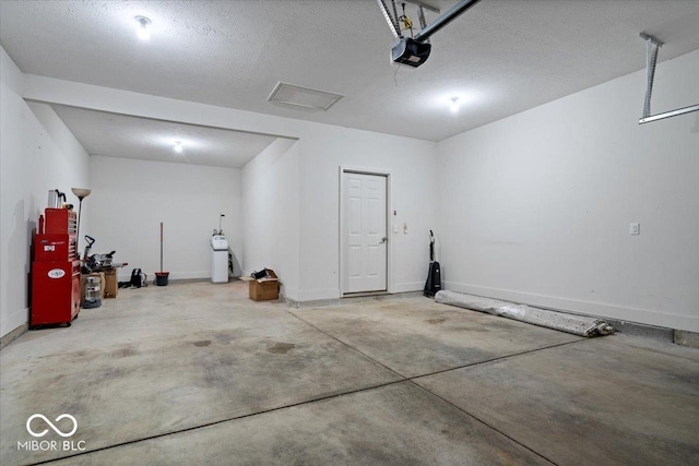 16573 Cava Dr, Fishers, IN 46037 - garage with a garage door opener and baseboards