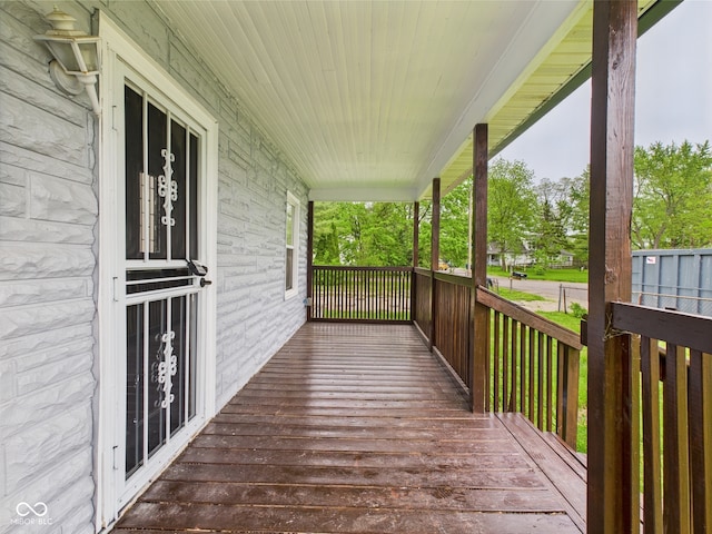wooden deck featuring a porch