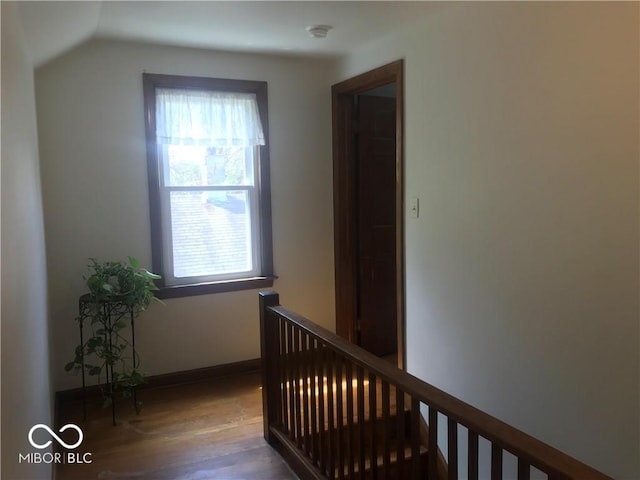 1714 Jefferson St, Anderson, IN 46016 - corridor featuring healthy amount of natural light, an upstairs landing, wood finished floors, and lofted ceiling