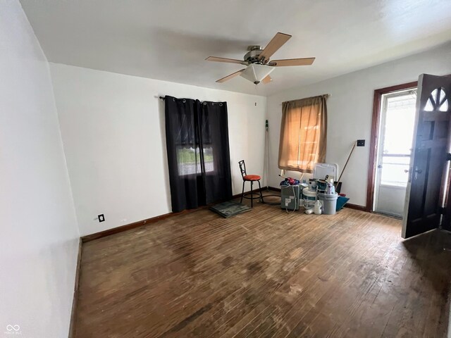1714 Jefferson St, Anderson, IN 46016 - foyer with wood finished floors, ceiling fan, and baseboards