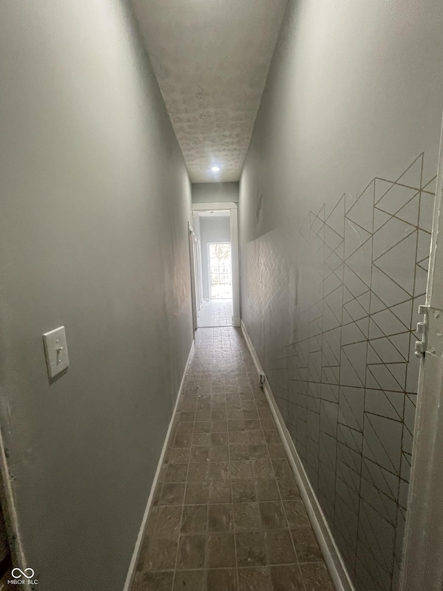 2116 Prospect St, Indianapolis, IN 46203 - hall with baseboards and a textured ceiling