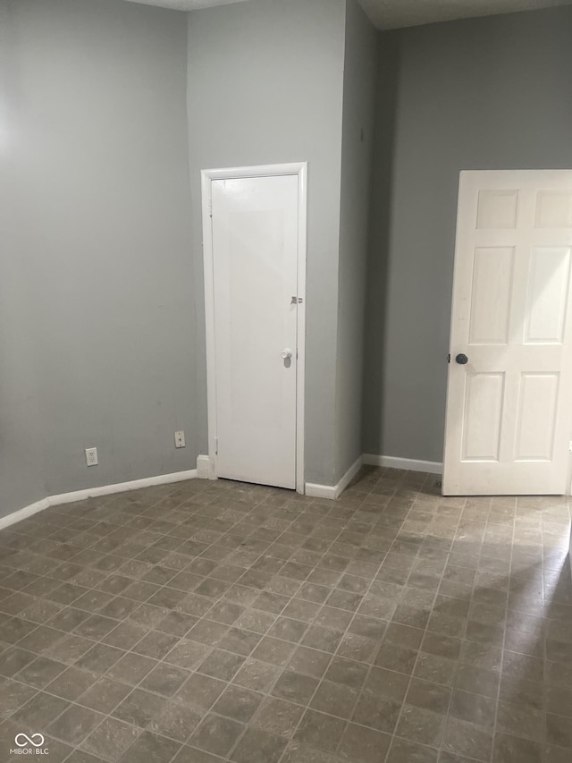 2116 Prospect St, Indianapolis, IN 46203 - spare room featuring baseboards