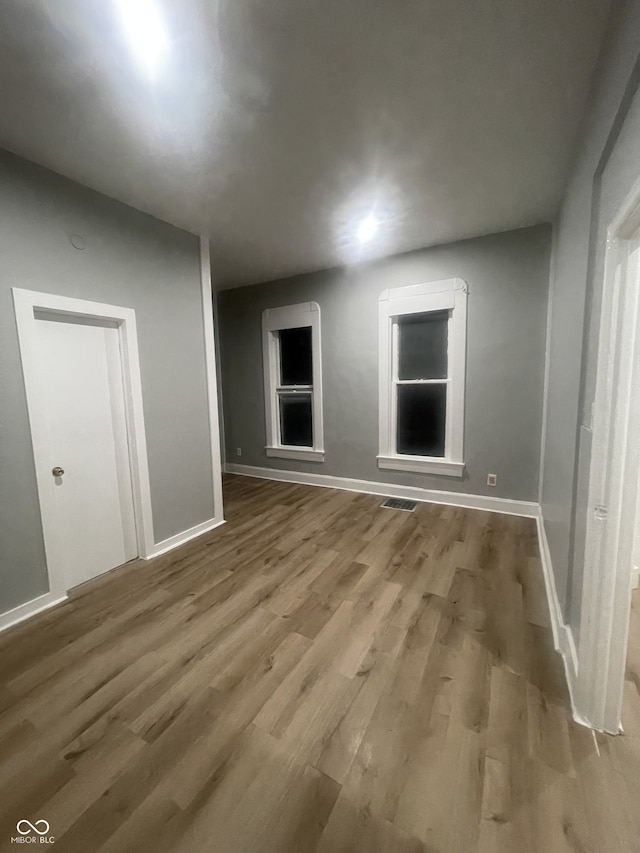 2116 Prospect St, Indianapolis, IN 46203 - unfurnished room with wood finished floors and baseboards