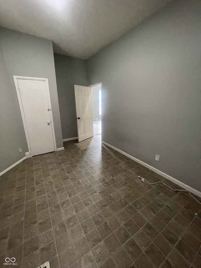 2116 Prospect St, Indianapolis, IN 46203 - empty room with baseboards