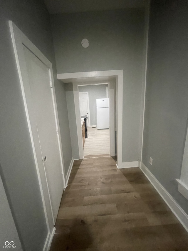 2116 Prospect St, Indianapolis, IN 46203 - corridor featuring wood finished floors and baseboards
