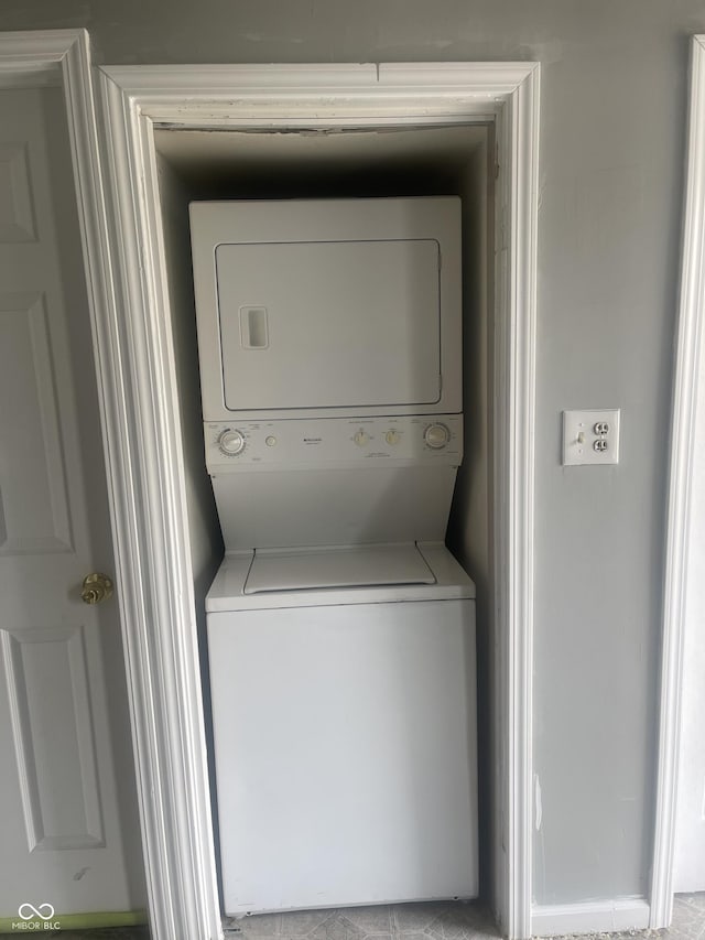2116 Prospect St, Indianapolis, IN 46203 - washroom with stacked washer and clothes dryer