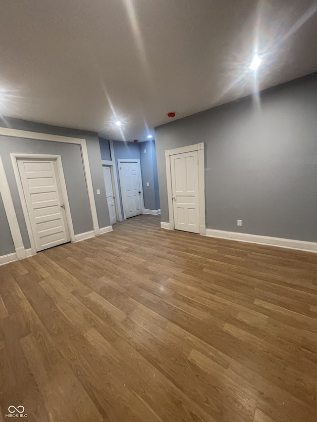 2116 Prospect St, Indianapolis, IN 46203 - basement with wood finished floors and baseboards