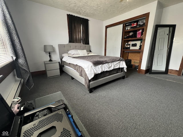 600 S Oak St, Fortville, IN 46040 - bedroom with carpet, a textured ceiling, and baseboards