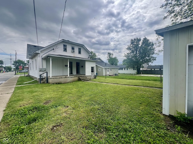 600 S Oak St, Fortville, IN 46040 - view of home's exterior with a porch and a lawn