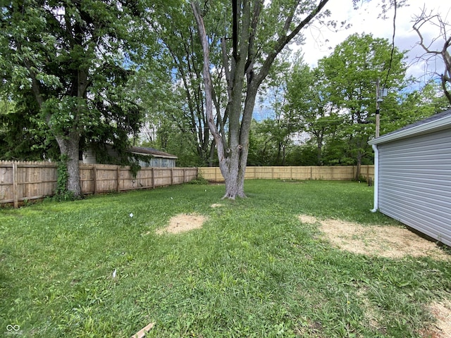 6150 E 25th St, Indianapolis, IN 46219 - view of yard featuring view of wooded area