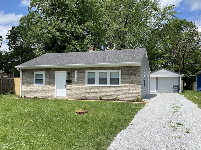 6150 E 25th St, Indianapolis, IN 46219 - view of front of house featuring stone siding, an outdoor structure, roof with shingles, a garage, and a chimney
