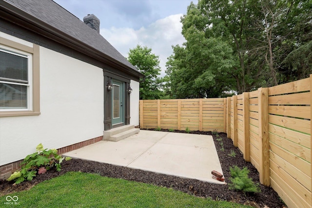 1502 Burdsal Pkwy, Indianapolis, IN 46208 - fenced backyard featuring a patio area and entry steps