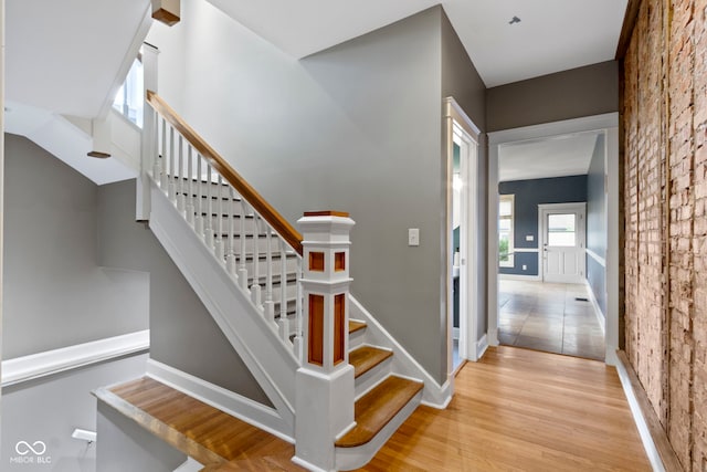 1526 Carrollton Ave, Indianapolis, IN 46202 - stairs with wood finished floors and baseboards