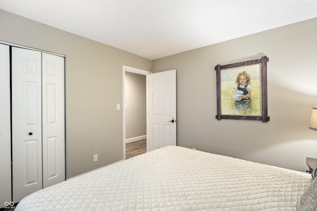 35 Osage Ct, Columbus, IN 47201 - bedroom with a closet and wood finished floors