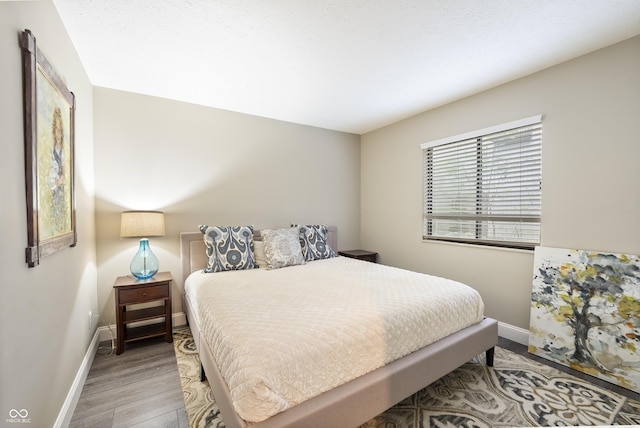 35 Osage Ct, Columbus, IN 47201 - bedroom with baseboards and wood finished floors
