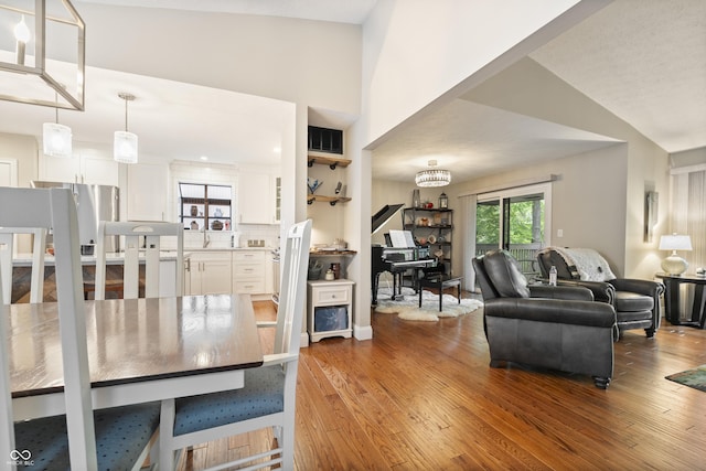 35 Osage Ct, Columbus, IN 47201 - dining room featuring wood finished floors and lofted ceiling